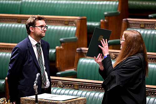 Freddie swearing in as an MP in 2024